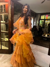 Astha Sharma in Our Orange Layered Lehenga Set from Retro-Spection Collection