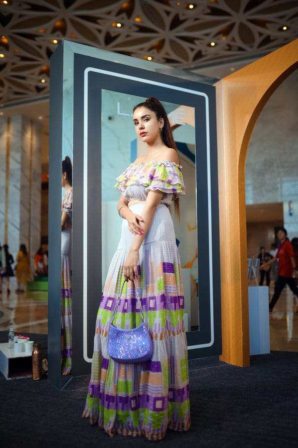 Jasleen Sabrawal in Geometric Printed Off Shoulder Crop Top and Printed Skirt from Magical Wilderness Collection