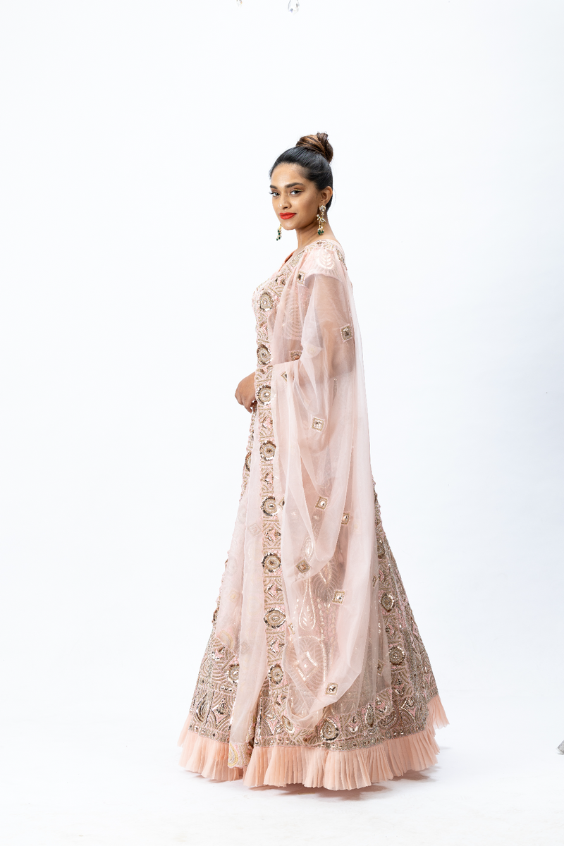 Dusty Pink Hand-embroidered Lehenga paired with Hand-embroidered Blouse with back tie-up and Hand-embroidered Dupatta with Buttis