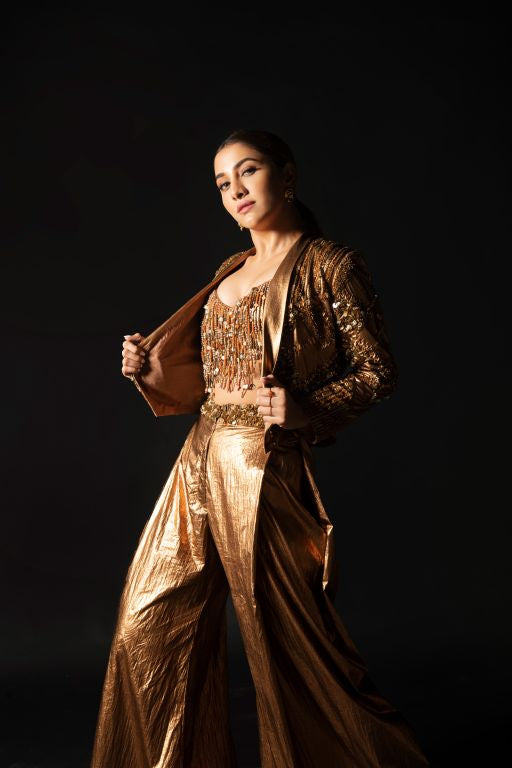 Rukmini Maitra in Nirmooha's Hand Embriodered Bronze Metallic Bralet, Bronze Metallic Short Jacket and Bronze Baggy Pants