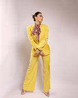 Hansika Motwani in Nirmooha's Lemon Yellow Blazer with Cording Detailing Suit and Geometric Printed Organza Tie Up Top with ruffle detailing from Magical Wilderness Collection